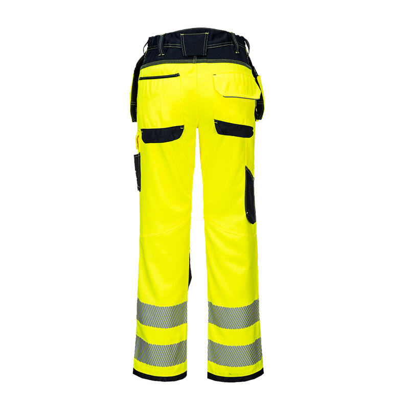 Rückansicht einer gelben PortWest Warnschutzhose mit schwarzen Kontrasten, Taschen und reflektierenden Streifen am Beinabschluss